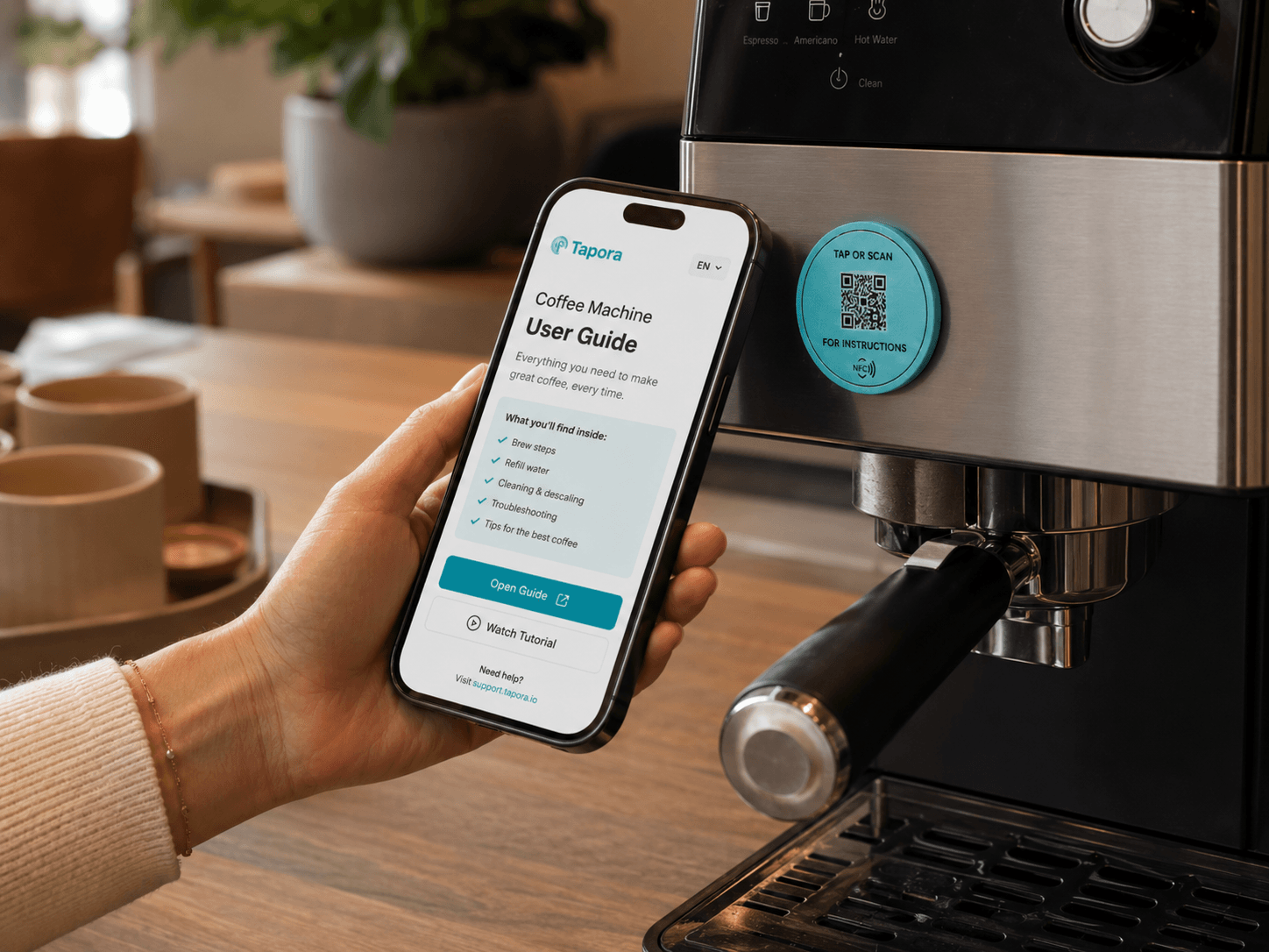 Tapora NFC badge on a coffee machine - tap for descaling guide and setup instructions