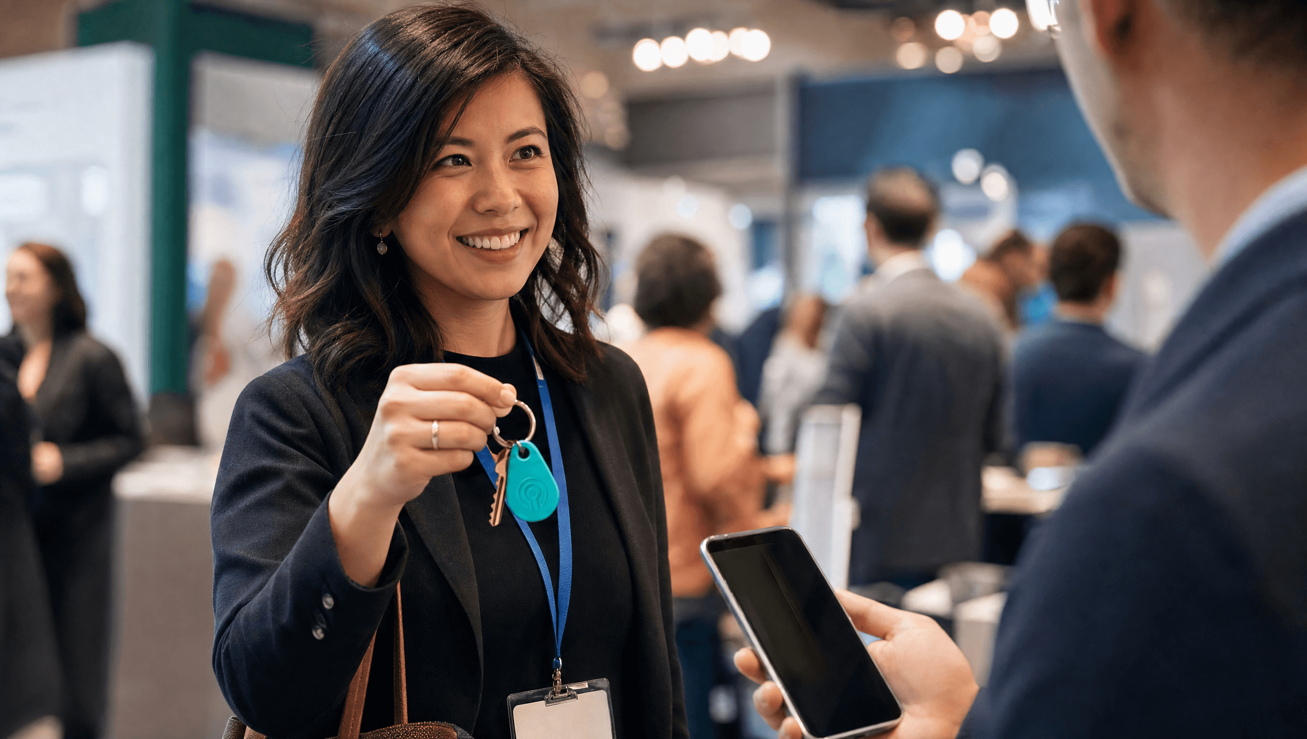 Professional tapping NFC keychain at a conference